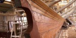 starboard lower planking shining with oil