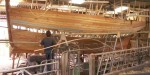 Top of steamed frames showing over nearly completed planking